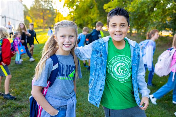 Students walking to school for National Walk to School Day.